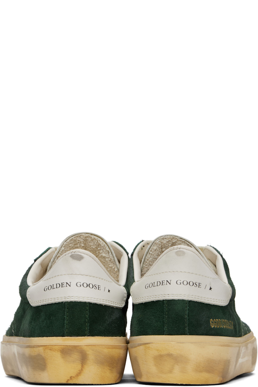 Handcrafted low-top suede sneakers in green. 

· Smudging throughout 
· Lace-up closure
· Logo stamp and star embossed at padded tongue 
· Padded collar 
· Logo flag at vamp 
· Contrast stitching at outer sides 
· Logo stamp at outer side and heel tab 
· Terrycloth lining 
· Treaded rubber sole 

Supplier color: Green/Milk