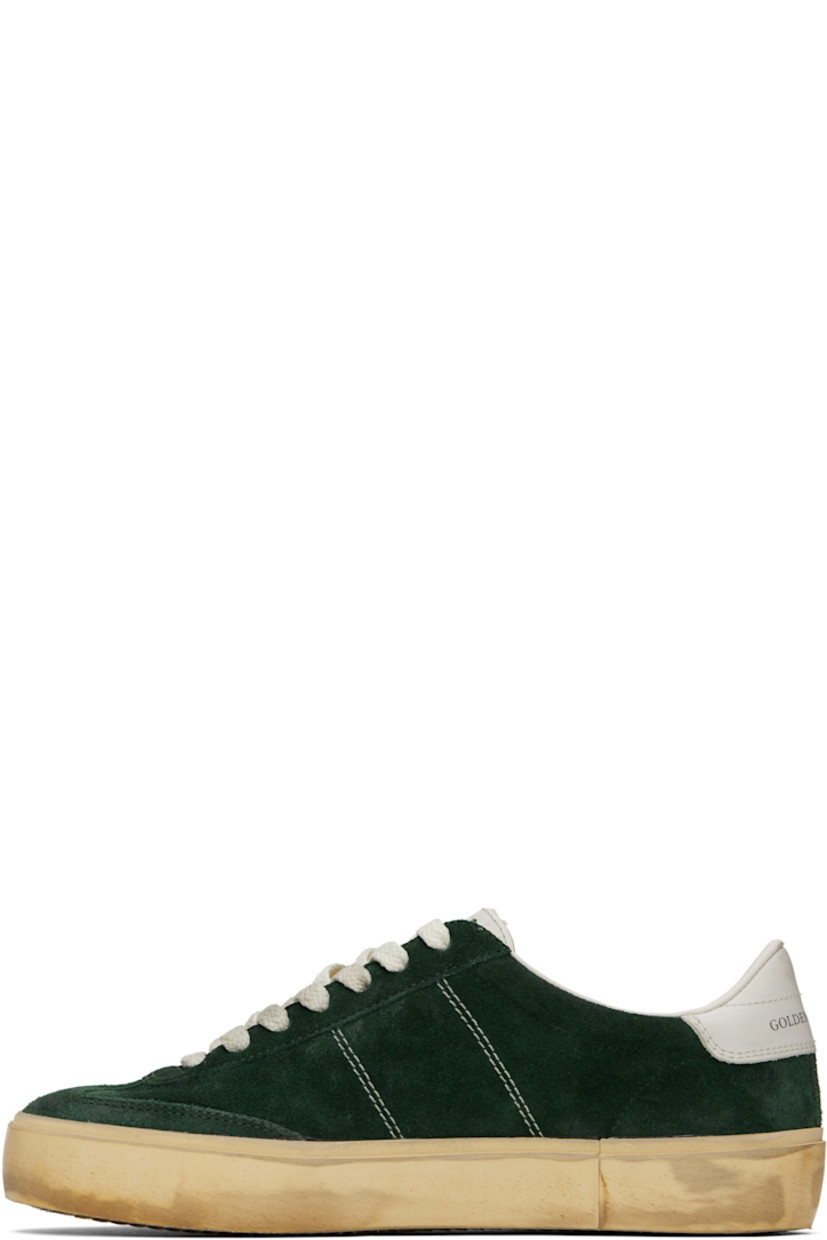 Handcrafted low-top suede sneakers in green. 

· Smudging throughout 
· Lace-up closure
· Logo stamp and star embossed at padded tongue 
· Padded collar 
· Logo flag at vamp 
· Contrast stitching at outer sides 
· Logo stamp at outer side and heel tab 
· Terrycloth lining 
· Treaded rubber sole 

Supplier color: Green/Milk