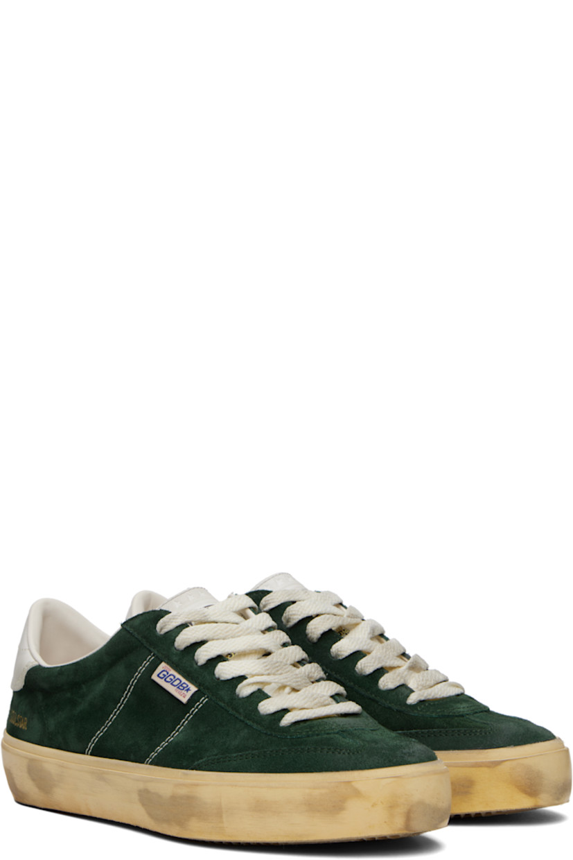 Handcrafted low-top suede sneakers in green. 

· Smudging throughout 
· Lace-up closure
· Logo stamp and star embossed at padded tongue 
· Padded collar 
· Logo flag at vamp 
· Contrast stitching at outer sides 
· Logo stamp at outer side and heel tab 
· Terrycloth lining 
· Treaded rubber sole 

Supplier color: Green/Milk