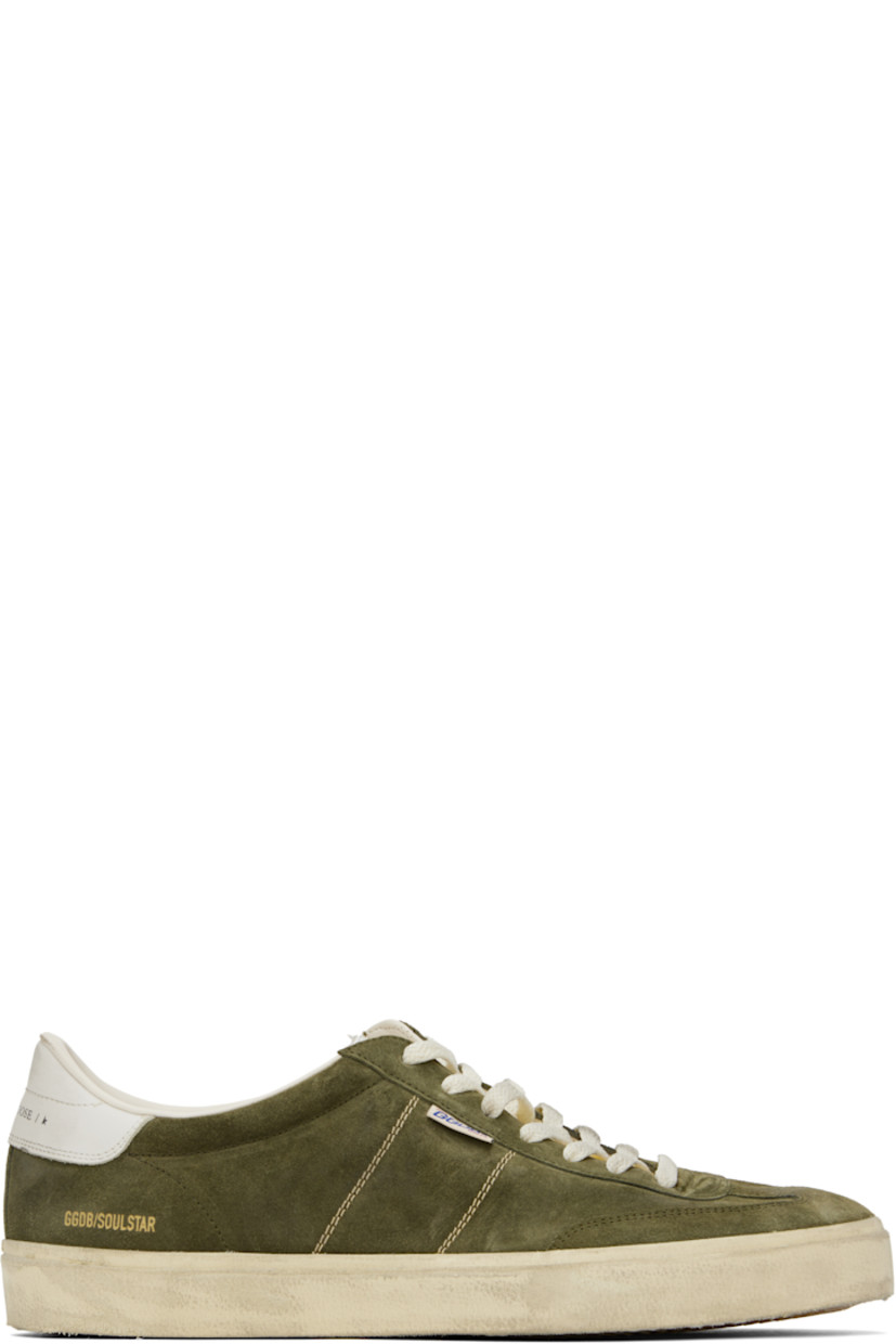 Handcrafted low-top suede sneakers in khaki.

· Smudging and subtle distressing throughout
· Lace-up closure
· Logo embossed at padded tongue
· Padded collar
· Topstitched stripes at sides
· Logo flag and stamp at outer side
· Logo printed at buffed leather heel tab
· Buffed faux-leather and terrycloth lining
· Treaded rubber sole

Supplier color: Military-green/White/Milk-white