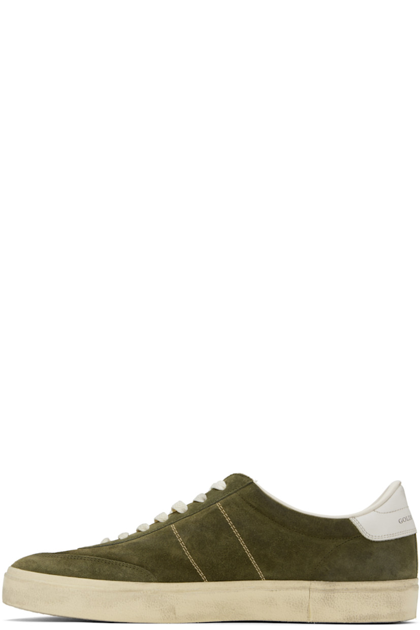 Handcrafted low-top suede sneakers in khaki.

· Smudging and subtle distressing throughout
· Lace-up closure
· Logo embossed at padded tongue
· Padded collar
· Topstitched stripes at sides
· Logo flag and stamp at outer side
· Logo printed at buffed leather heel tab
· Buffed faux-leather and terrycloth lining
· Treaded rubber sole

Supplier color: Military-green/White/Milk-white