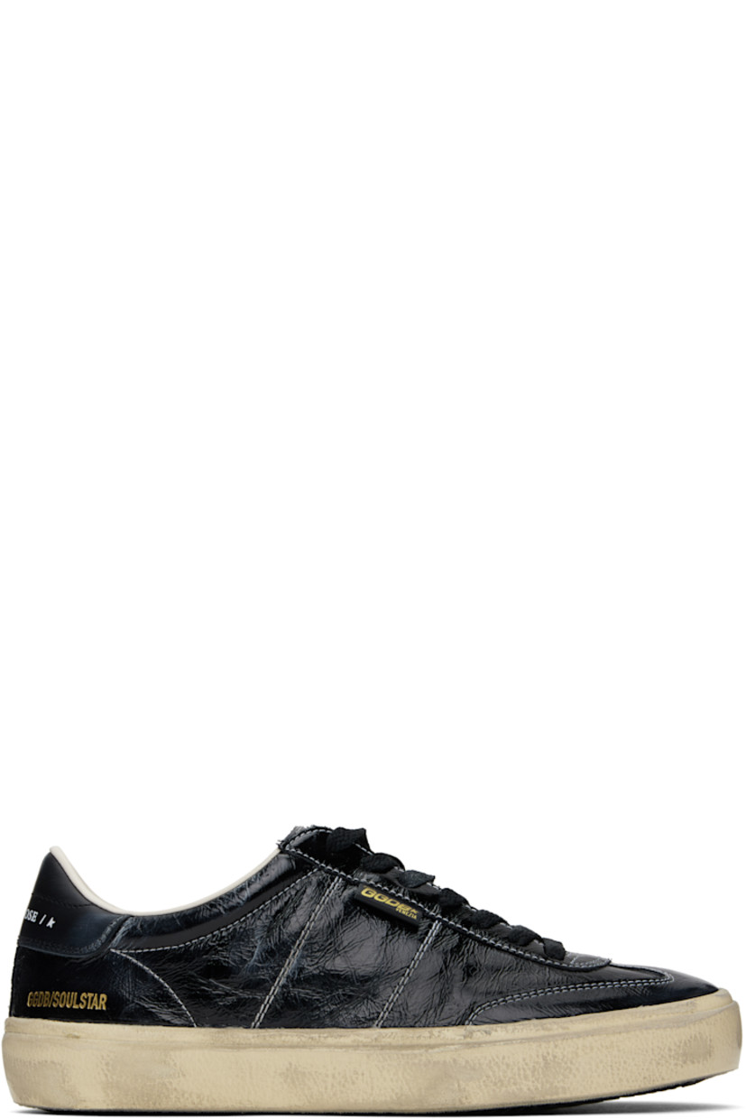 Handcrafted low-top crinkled patent leather sneakers in black.

· Smudging and subtle distressing throughout
· Lace-up closure
· Logo embossed at padded tongue
· Padded collar
· Logo flag and stamp at outer side
· Logo printed at buffed leather heel tab
· Buffed faux-leather and terrycloth lining
· Treaded rubber sole
· Contrast stitching in white

Supplier color: Black