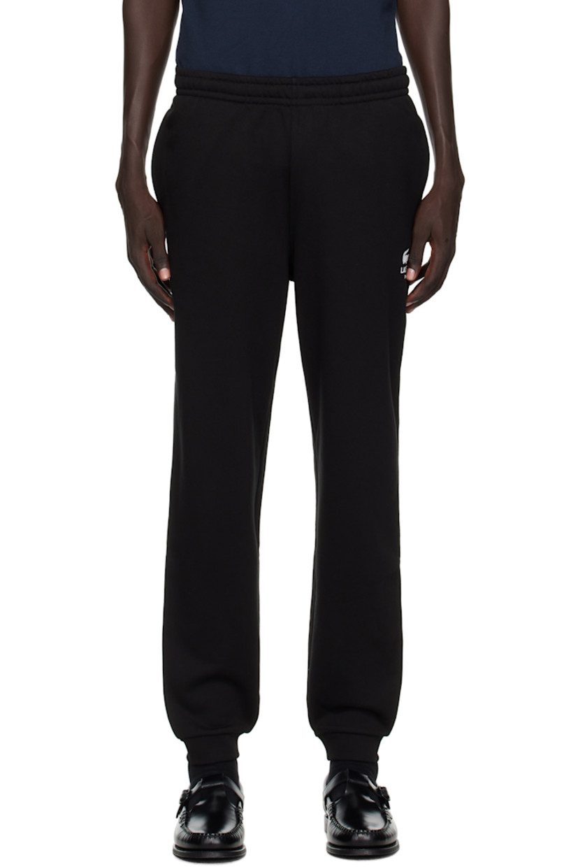 Cotton French terry sweatpants.

· Tapered
· Concealed drawstring at elasticized waistband
· Three-pocket styling
· Logo printed at front
· Rib-knit cuffs
· Embroidered logo patch at back

Supplier color: Black