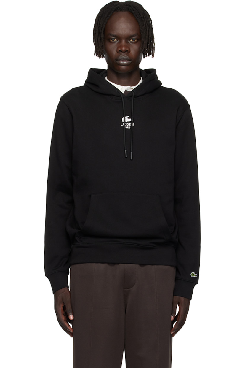Cotton French terry hoodie.

· Drawstring at hood
· Logo printed at chest and back
· Kangaroo pocket at waist 
· Rib-knit hem and cuffs
· Embroidered logo patch at cuff

Supplier color: Black