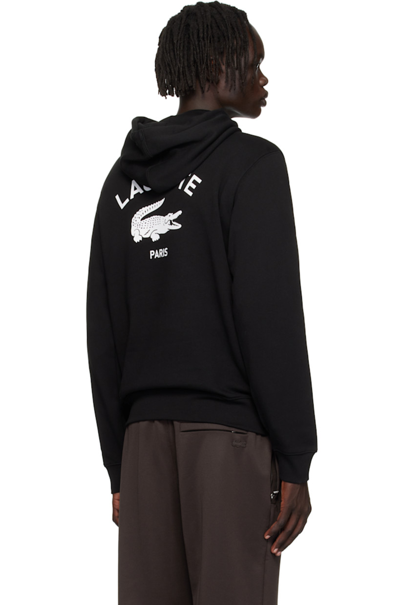 Cotton French terry hoodie.

· Drawstring at hood
· Logo printed at chest and back
· Kangaroo pocket at waist 
· Rib-knit hem and cuffs
· Embroidered logo patch at cuff

Supplier color: Black