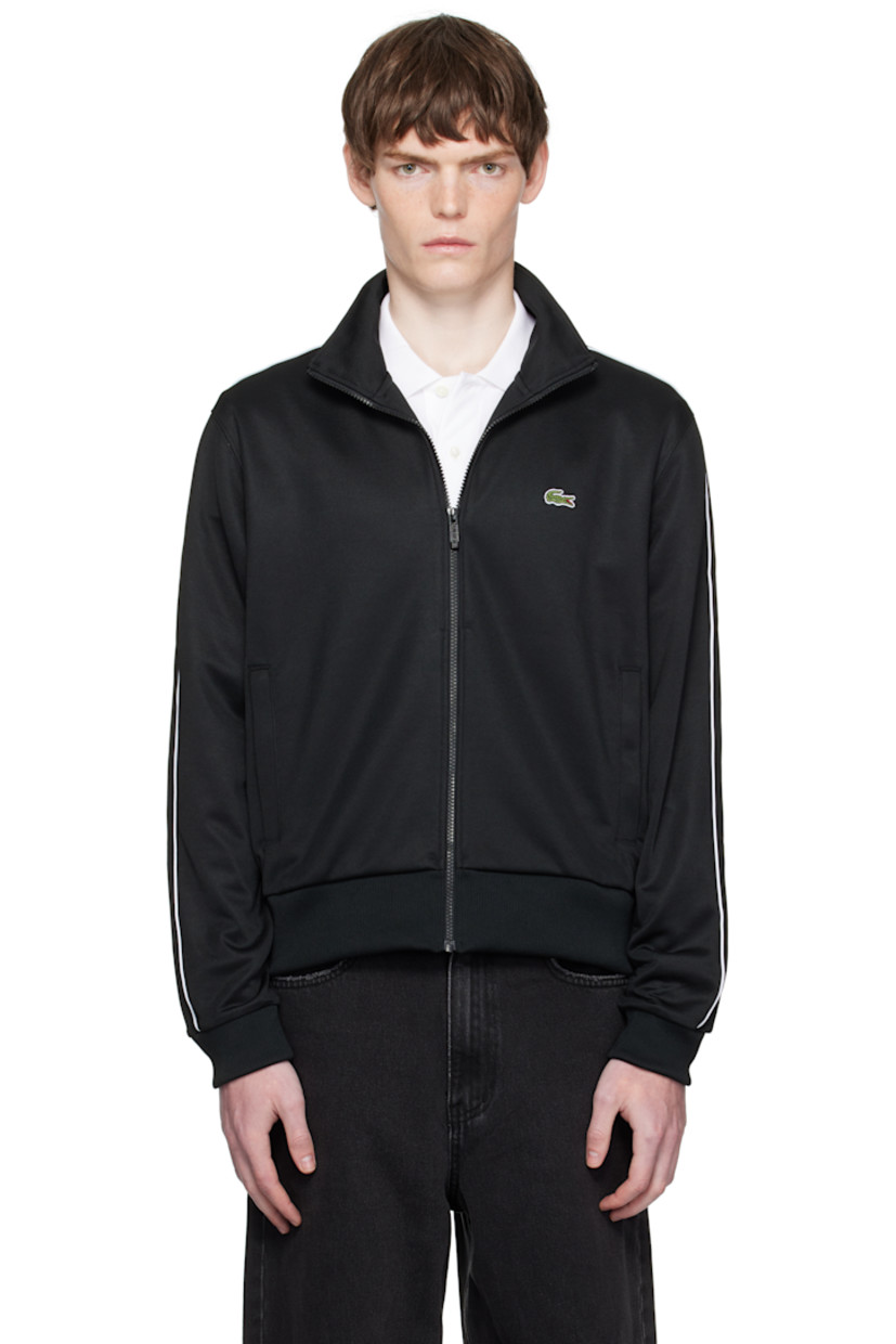 Recycled polyester- and organic cotton-blend piqué track jacket.

· Stand collar
· Zip closure
· Embroidered logo patch at chest
· Zip pockets at waist
· Rib-knit hem and cuffs
· Piping at sleeves

Supplier color: Black