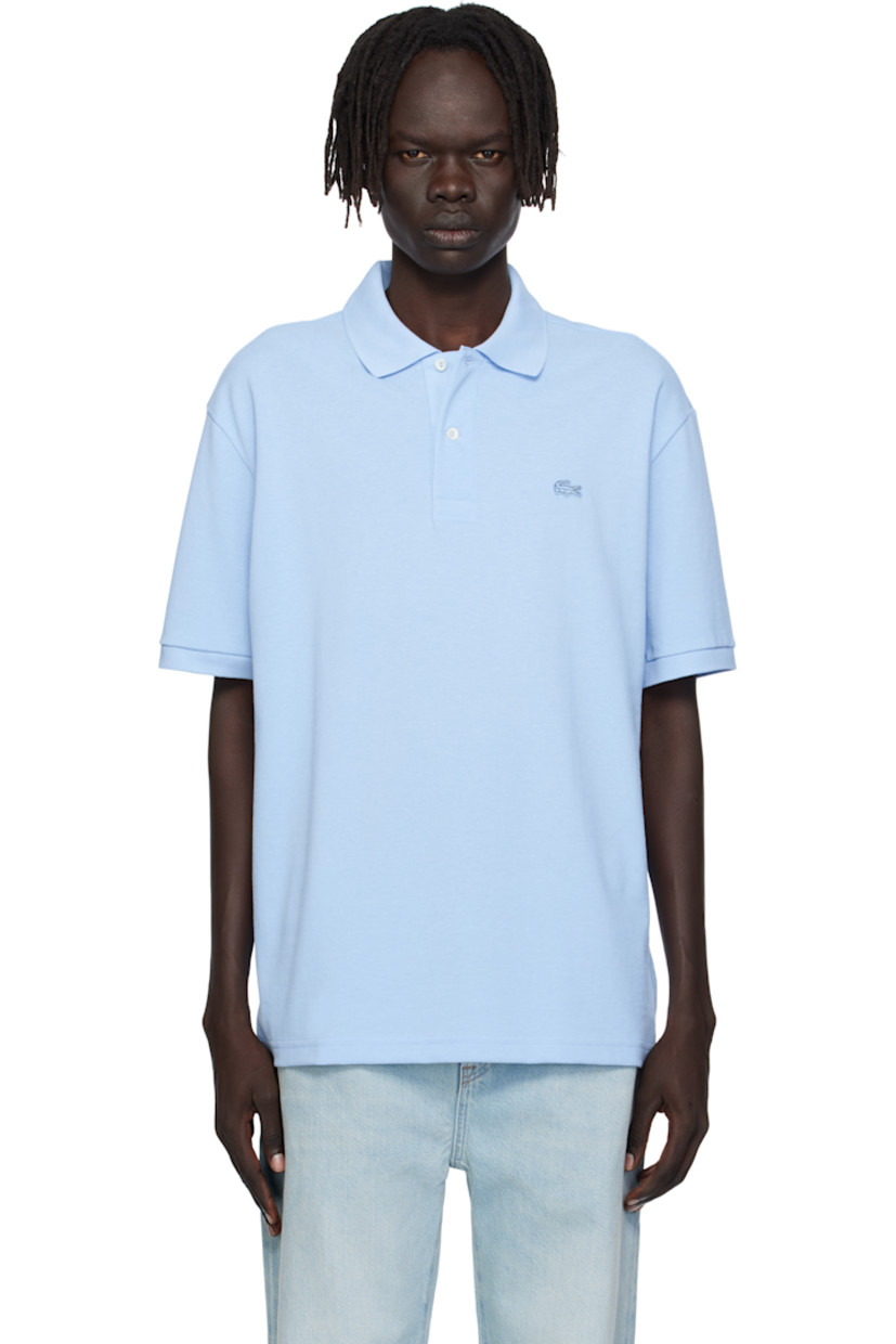Cotton piqué polo. 

· Rib-knit spread collar and cuffs
· Two-button placket 
· Embroidered logo patch at chest 
· Dropped shoulders

Supplier color: Overview