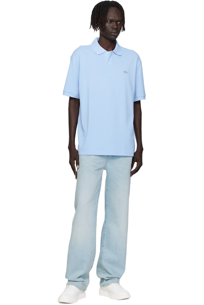 Cotton piqué polo. 

· Rib-knit spread collar and cuffs
· Two-button placket 
· Embroidered logo patch at chest 
· Dropped shoulders

Supplier color: Overview