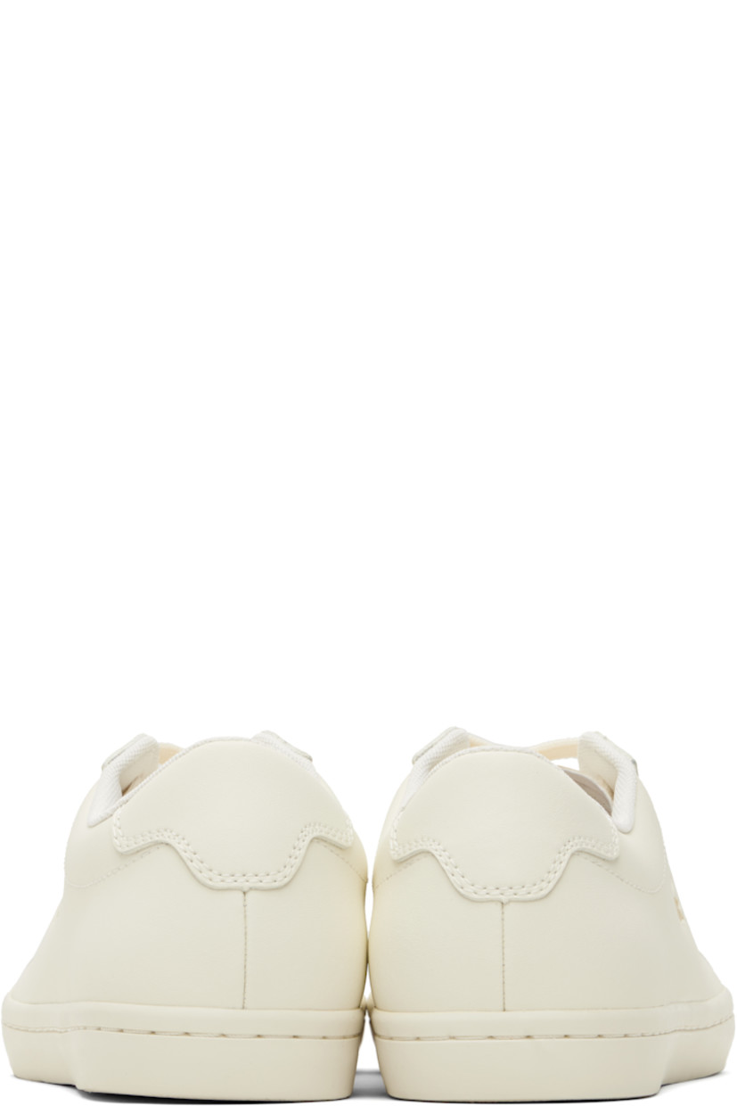 Low-top coated leather sneakers.

· Lace-up closure
· Logo embossed at tongue
· Padded tongue and collar
· Gold-tone logo stamp at outer side
· Treaded rubber sole

Supplier color: Off white/Off white