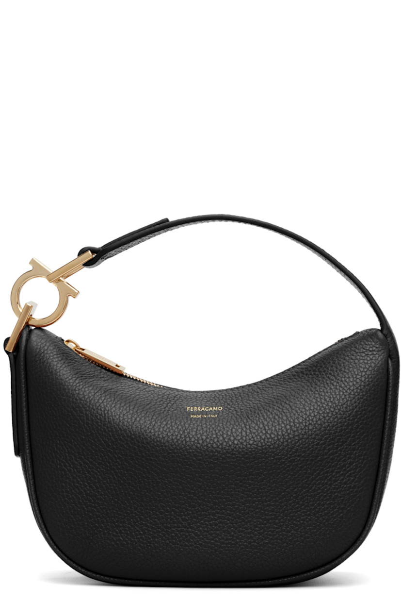 Grained calfskin shoulder bag.

· Logo hardware at fixed shoulder strap
· Logo stamp at face
· Zip closure
· Twill lining
· H5.5" x W8" x D3.5"

Supplier color: Black