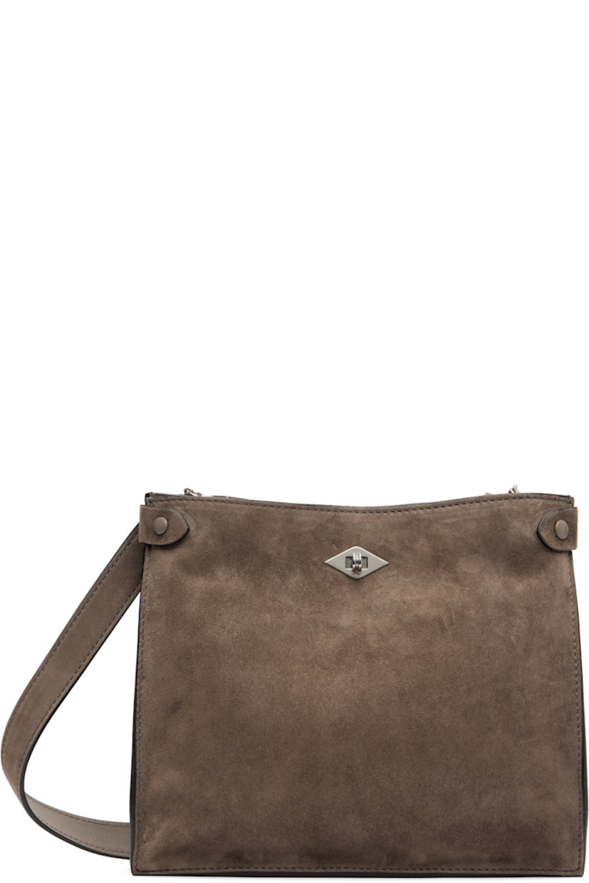 Handcrafted calfskin suede shoulder bag.

· Burnished edges throughout 
· Adjustable and detachable crossbody strap
· Patch pocket at back face
· Press-stud tab at sides
· Turn-lock closure 
· Patch and zip pockets at interior 
· Suede lining 
· H8" x W9" x D2"

Supplier color: Clay
