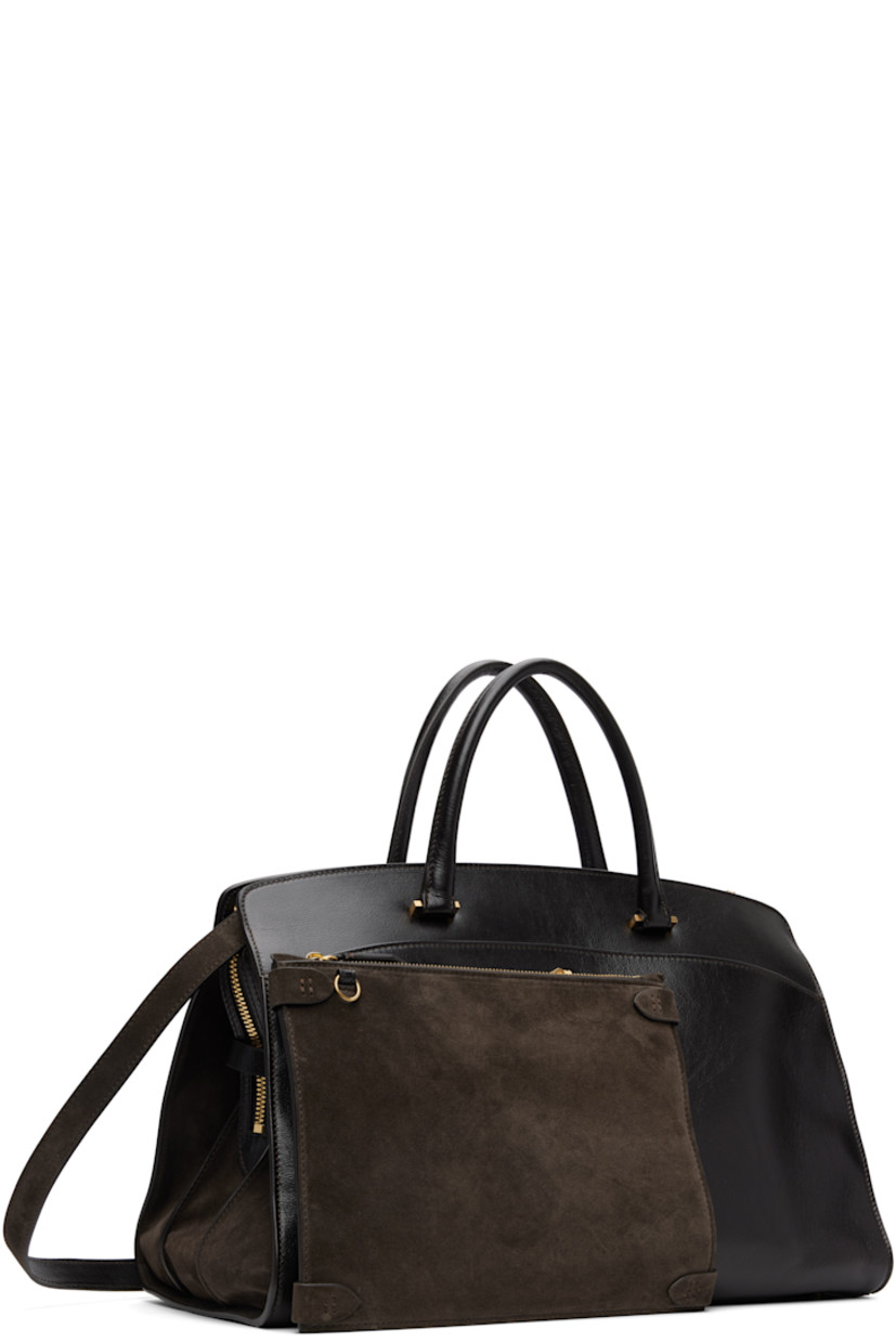 Vegetable-tanned and grained buffalo leather tote. Detachable interior-compartment divider converts to crossbody pouch. 

· Rolled leather carry handles
· Single adjustable and detachable crossbody strap
· Compartment with turn-lock closure at face
· Pen and card slots, pocket, and phone compartment
· Two-way zip closure
· 14" laptop compartment and zip pocket at interior
· Full suede lining
· H10.5" x W16" x D9"

Supplier color: Suede cacao/Chocolate
