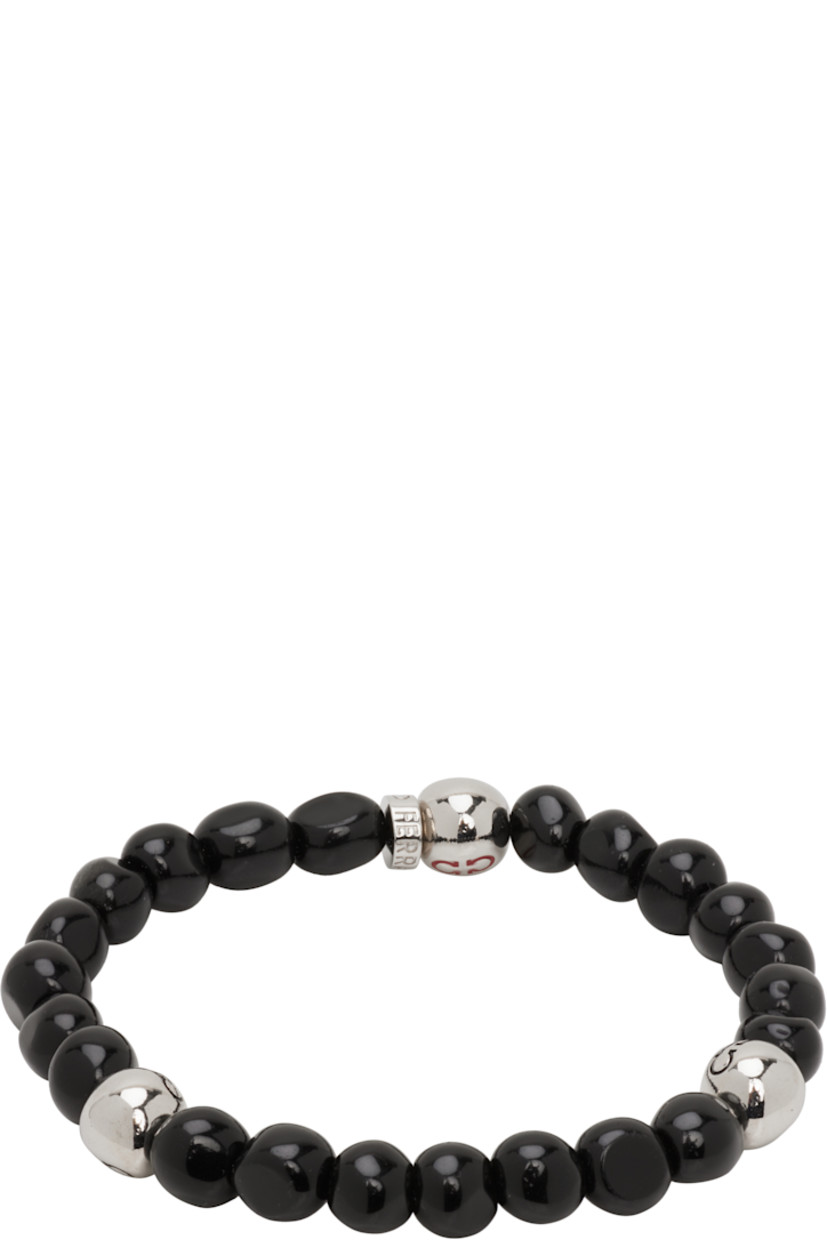 Elasticized beaded stone bracelet in black.

· Logo-engraved silver-tone brass beads
· D2.75"

Supplier color: Black