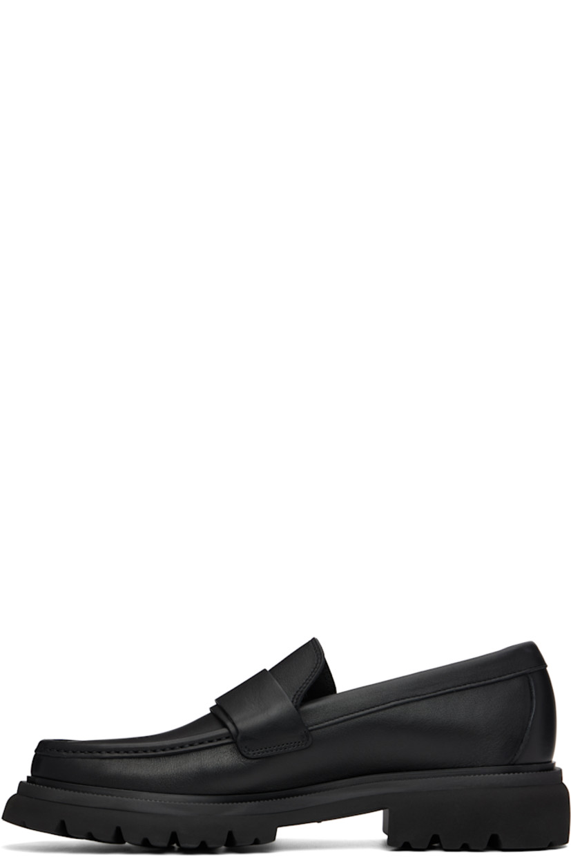 Buffed calfskin loafers.

· Moc toe
· Strap with logo hardware at vamp
· Buffed leather lining
· Treaded rubber sole
· Heel: H1.5"

Supplier color: Black