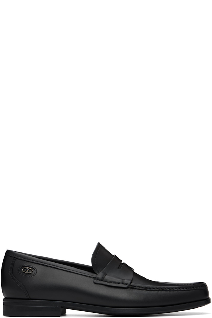 Buffed calfskin loafers.

· Square moc toe
· Strap with cutout at vamp
· Logo hardware at outer side
· Suede lining
· Rubber sole

Supplier color: Nero