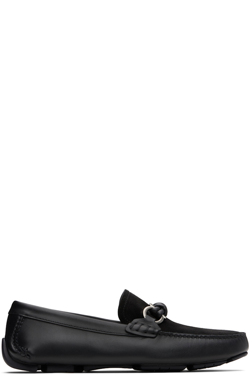 Calfskin suede and buffed calfskin loafers.

· Moc toe
· Logo hardware at vamp
· Buffed leather lining
· Pebbled rubber sole

Supplier color: Black
