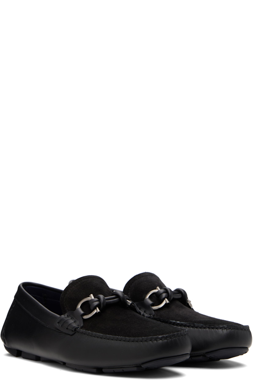 Calfskin suede and buffed calfskin loafers.

· Moc toe
· Logo hardware at vamp
· Buffed leather lining
· Pebbled rubber sole

Supplier color: Black