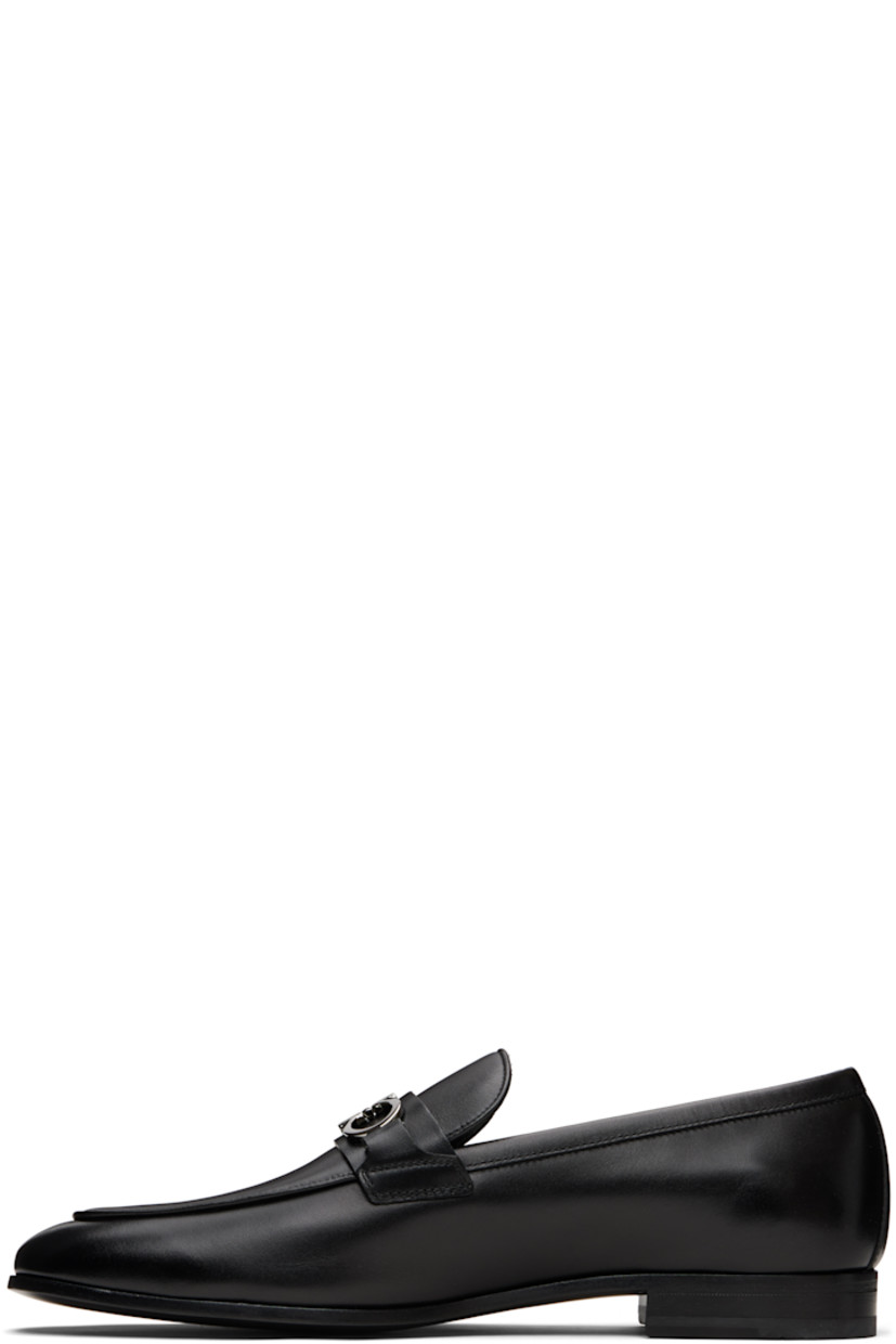 Buffed calfskin loafers.

· Square moc toe
· Logo hardware at vamp
· Buffed leather lining
· Stacked leather heel with rubber injection
· Calfskin sole

Supplier color: Black