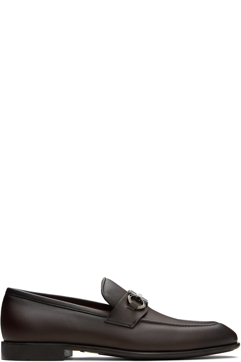Hammered calfskin loafers.

· Square moc toe
· Logo hardware at vamp
· Buffed leather lining
· Rubber sole

Supplier color: Testa di moro