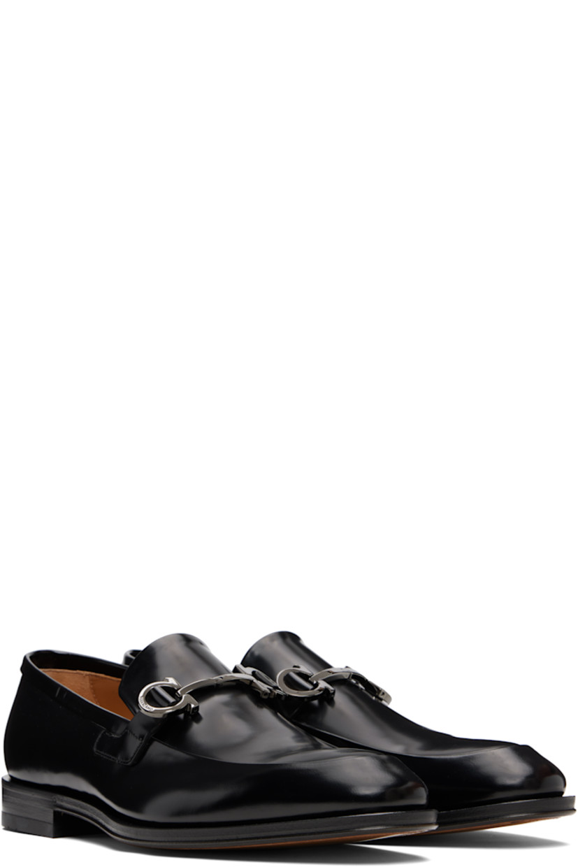 Patent calfskin loafers.

· Square moc toe
· Logo hardware at vamp
· Buffed leather lining
· Stacked leather heel with rubber injection
· Calfskin sole

Supplier color: Black
