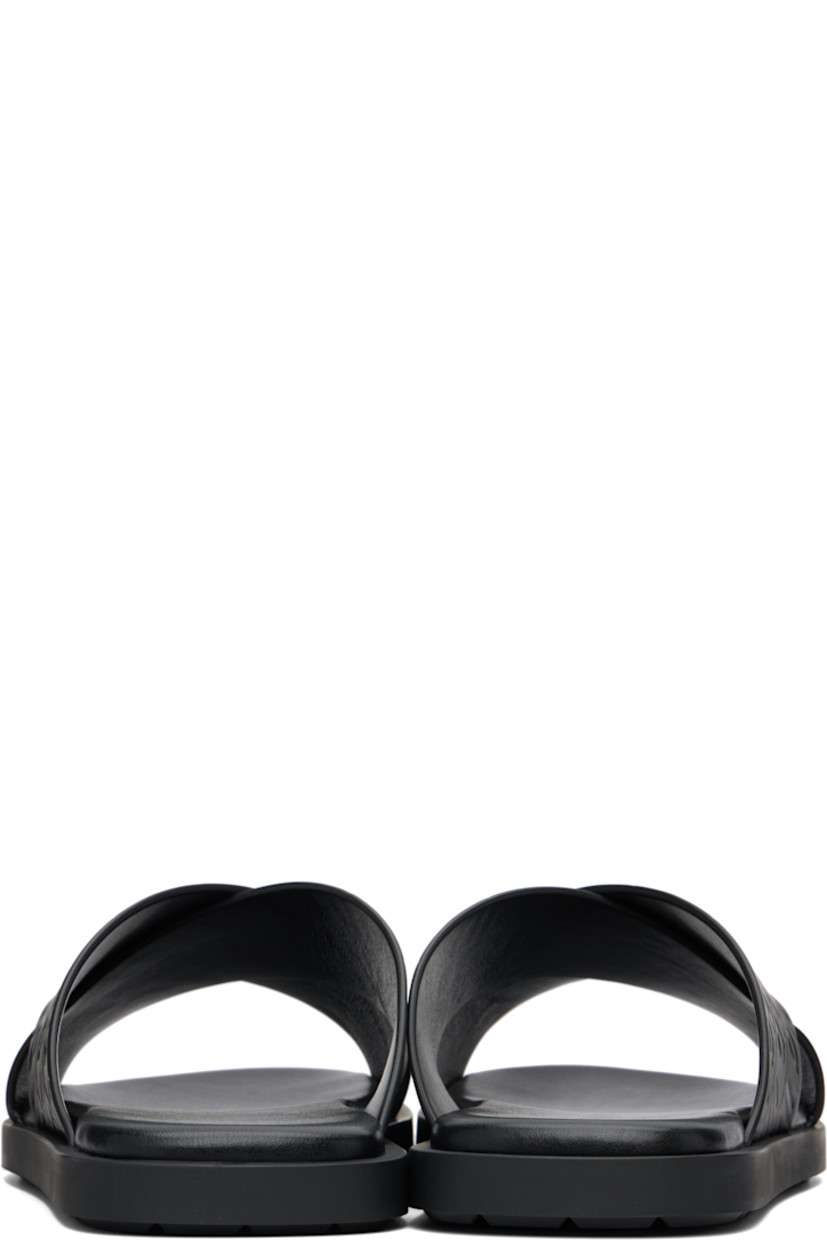 Buffed calfskin sandals.

· Open toe
· Logo-embossed crisscrossing straps
· Treaded rubber sole
· Logo printed at padded calfskin footbed
· Treaded rubber sole

Supplier color: Black