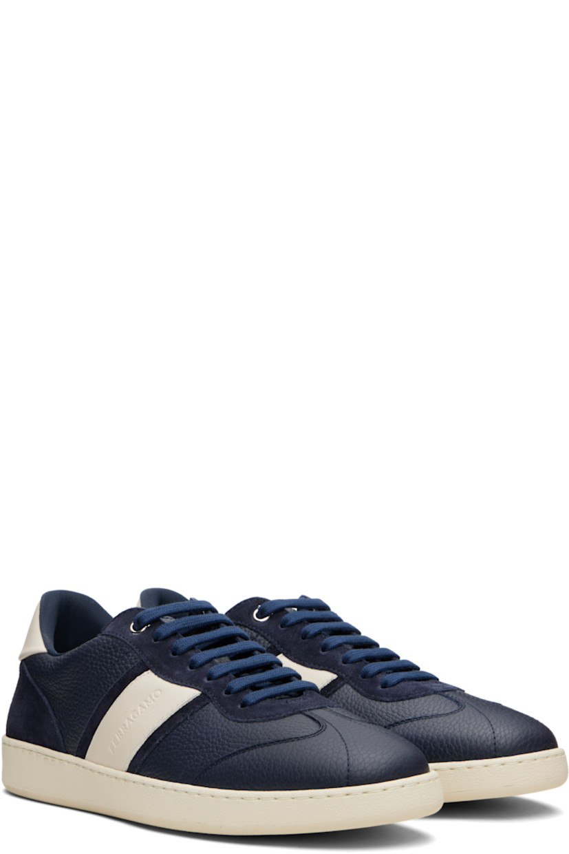 Low-top paneled calfskin suede and grained calfskin sneakers.

· Logo embossed throughout
· Lace-up closure
· Padded tongue and collar
· Logo embossed at heel
· Mesh lining
· Treaded rubber sole

Supplier color: Blue Marine/Mascarpone