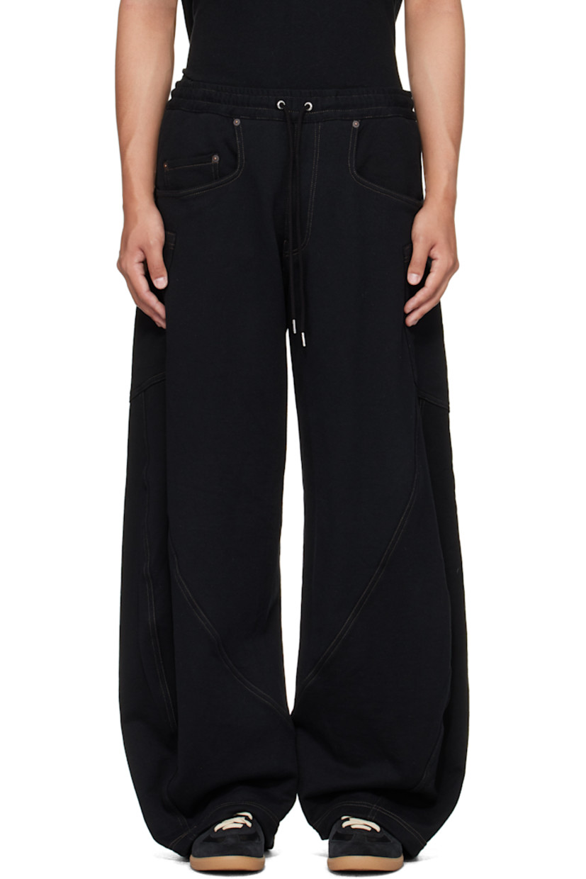 Heavyweight cotton French terry sweatpants.

· Drawstring at elasticized waistband
· Three-pocket styling
· Zip fly
· Patch pocket at outseams
· Contrast stitching in tan

Supplier color: Black