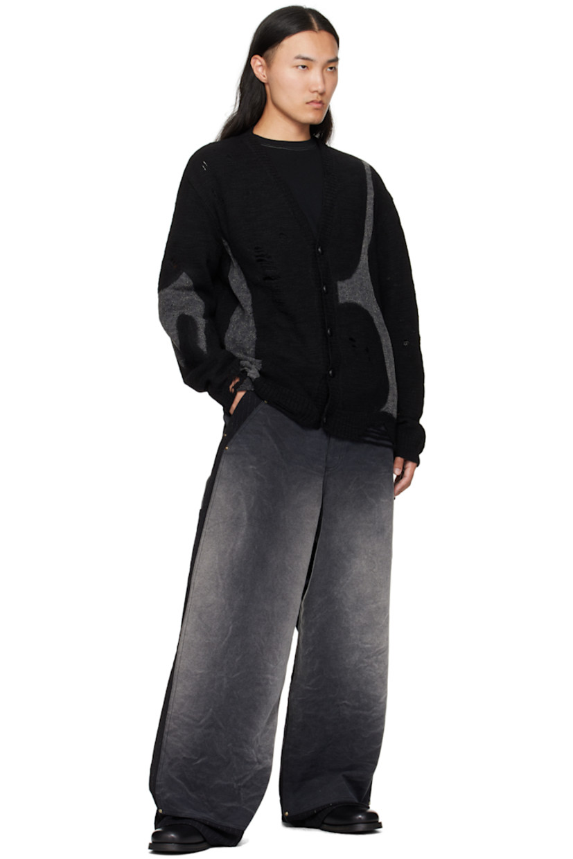 Knit wool cardigan.

· Floral-embroidered poplin panels throughout
· Distressing and laddering throughout
· Rib-knit V-neck, hem, and cuffs
· Woven-leather button closure
· Dropped shoulders

Supplier color: Black