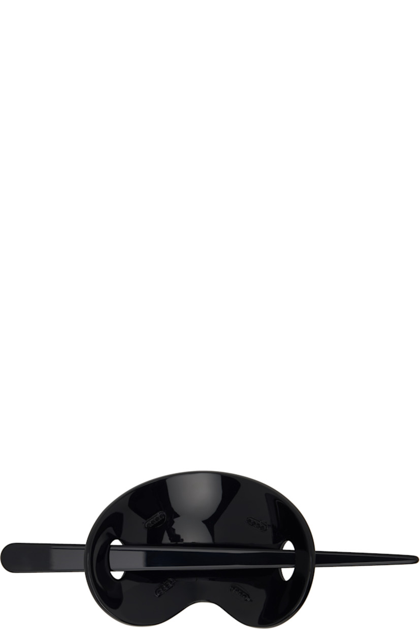 Acetate hair-pin barrette.

· Logo embossed at pin
· Barrette: W3.5"
· Pin: L6" 

Supplier color: Black