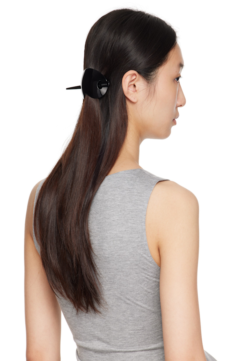 Acetate hair-pin barrette.

· Logo embossed at pin
· Barrette: W3.5"
· Pin: L6" 

Supplier color: Black