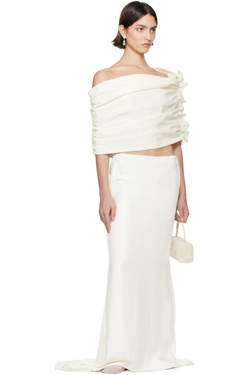Cotton velvet top.

· Off-the-shoulder and asymmetrical construction
· Ruching at sides
· Ruffled trim at side seam
· Full poplin lining

Part of the exclusive SSENSE Bridal capsule.

Supplier color: Ivory