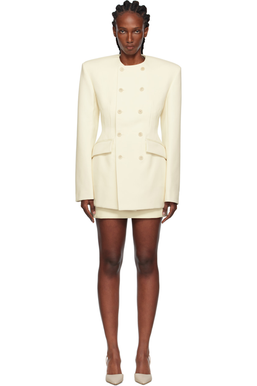 Nylon- and wool-blend twill minidress.

· Round neck
· Double-breasted button closure
· Darts at cinched waist
· Flap pockets at front
· Padded shoulders
· Pinched seam at sleeves
· Welt pocket at interior
· Full satin twill lining

Part of the WARDROBE.NYC x Rosie Huntington-Whiteley collaboration.

Supplier color: Ivory