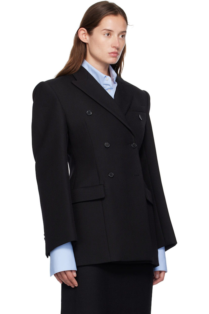 Heavyweight woven virgin wool blazer.

· Peaked lapel
· Double-breasted button closure
· Darts at front
· Flap pockets at waist
· Padded shoulders
· Buttoned surgeon's cuffs
· Buttoned pocket at interior
· Full satin lining

Supplier color: Black