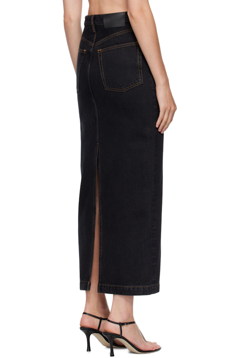 Non-stretch denim midi skirt.

· Belt loops
· Five-pocket styling
· Button fly
· Leather logo patch at back waistband
· Central vent at back hem
· Contrast stitching in tan

Supplier color: Black