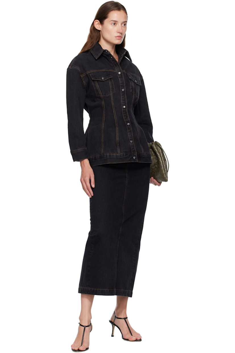 Non-stretch denim midi skirt.

· Belt loops
· Five-pocket styling
· Button fly
· Leather logo patch at back waistband
· Central vent at back hem
· Contrast stitching in tan

Supplier color: Black