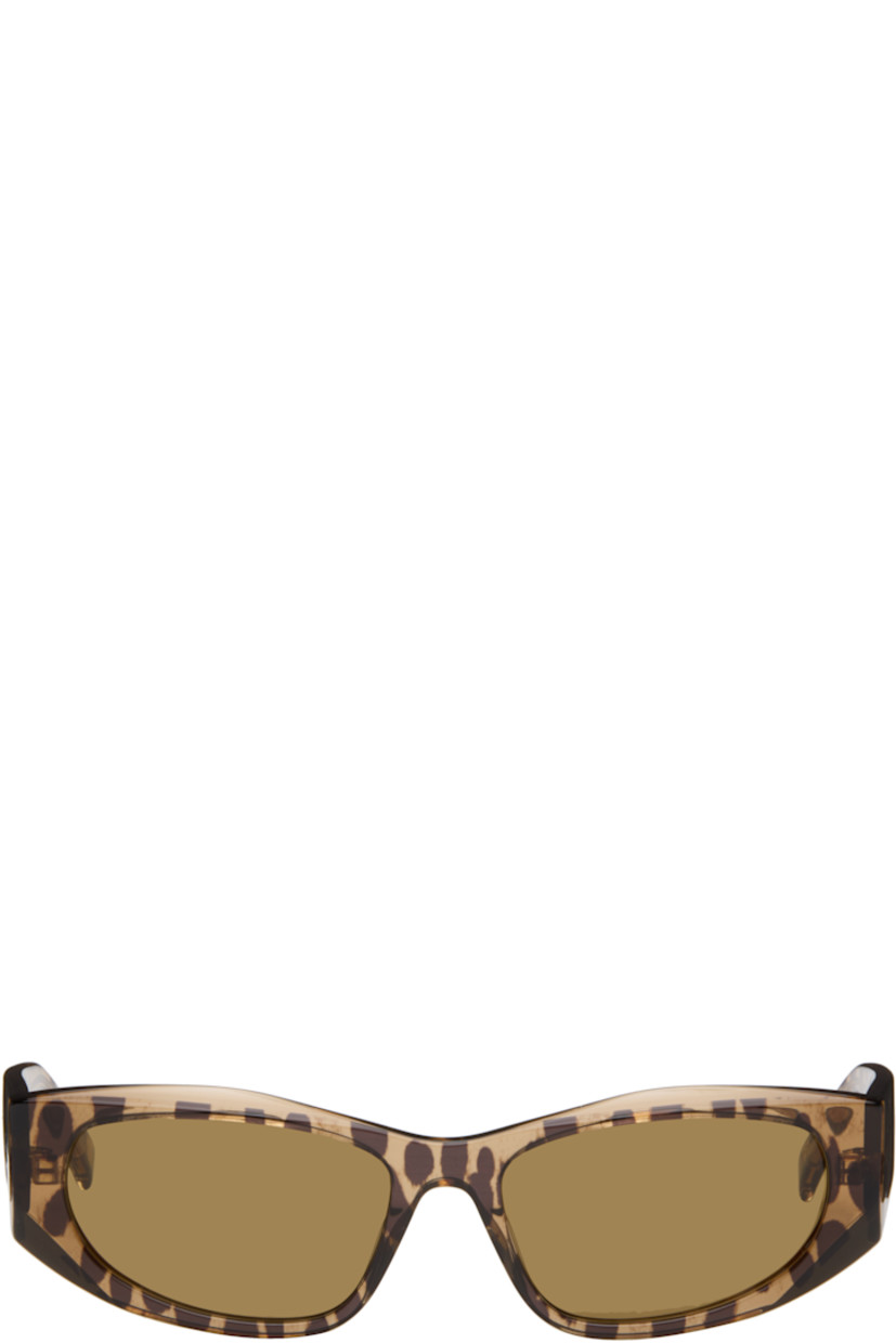 Cat-eye tortoiseshell acetate-frame sunglasses.

· Brown lenses
· Integrated nose pads
· Inset logo hardware at temples
· Exposed core wires
· Includes pouch
· Size: 56.17 135

Supplier color: Animal/Brown
