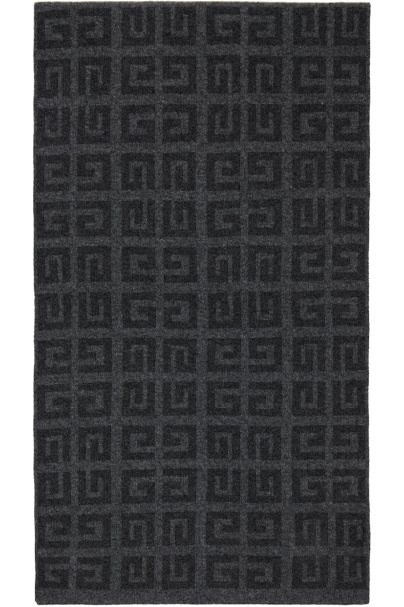 Rectangular knit wool- and cashmere-blend scarf.

· Jacquard logo at face
· Jacquard logo pattern at back face
· L68" x W13"

Supplier color: Grey mix/Charcoal