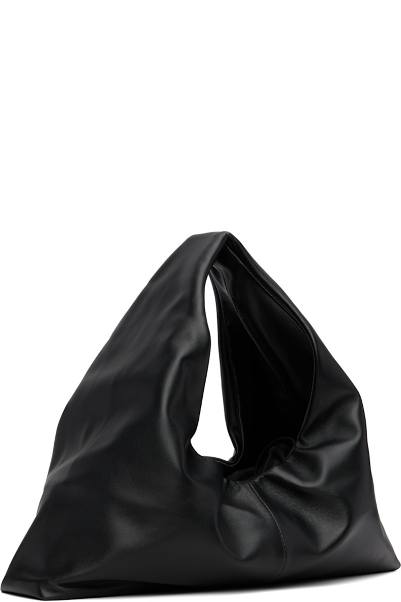 Grained lambskin tote.

· Integrated carry handle
· Bungee-style drawstring closure
· Partial satin twill lining
· H7" x W16.75" x D3"
· Total height: H12"

Supplier color: Black
