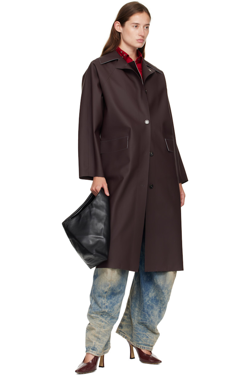 Grained lambskin tote.

· Integrated carry handle
· Bungee-style drawstring closure
· Partial satin twill lining
· H7" x W16.75" x D3"
· Total height: H12"

Supplier color: Black