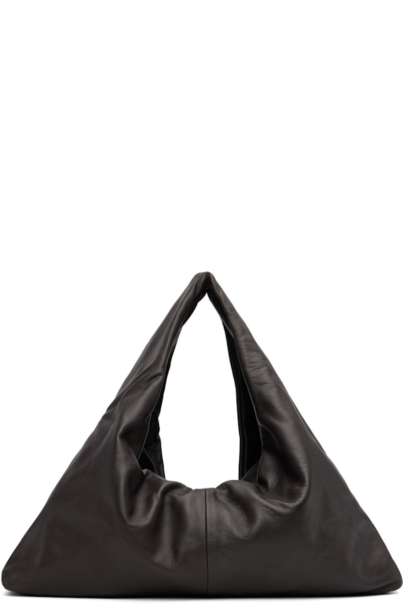 Grained lambskin tote.

�· Integrated carry handle
· Bungee-style drawstring closure
· Partial satin twill lining
· H7" x W16.75" x D3"
· Total height: H12"

Supplier color: Dark brown