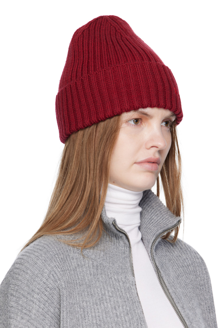 Rib-knit merino wool beanie. Logo embroidered at rolled brim.

Supplier color: Burgundy