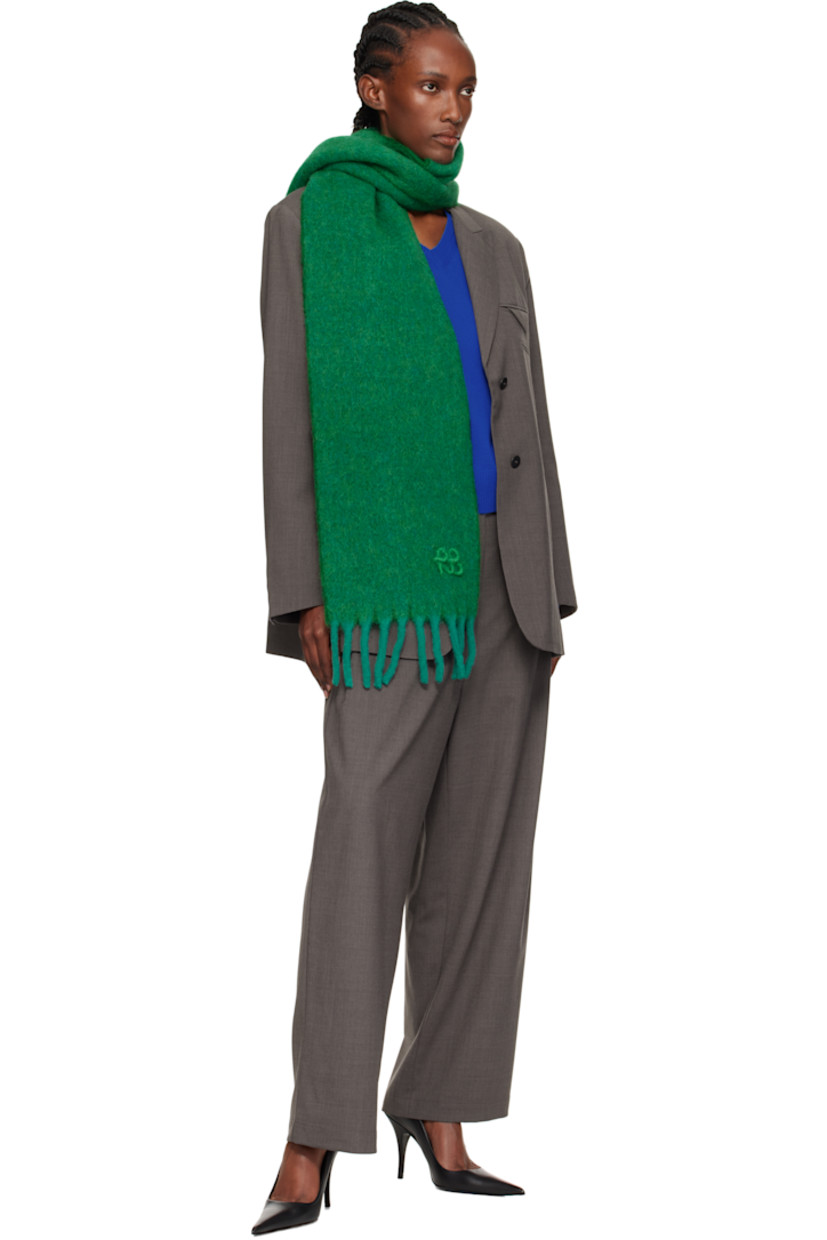 Rectangular brushed knit wool- and alpaca-blend scarf.

· Logo appliqué at face
· Fringed detailing at ends
· L76.75" x W10"

Supplier color: Green
