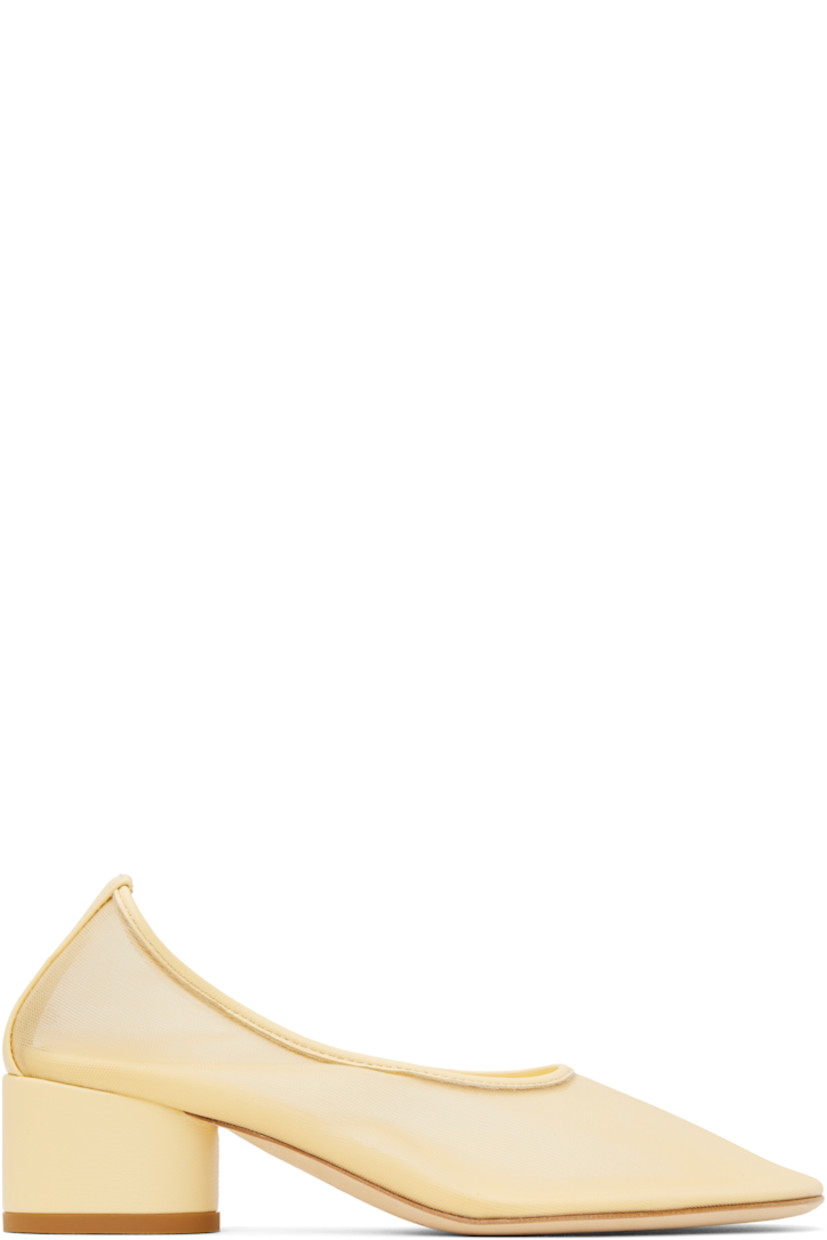 Handcrafted semi-sheer mesh heels in yellow.

· Grained leather trim at collar and heel
· Covered block heel with rubber injection
· Nubuck sole
· Heel: H1.75"

Supplier color: Crema