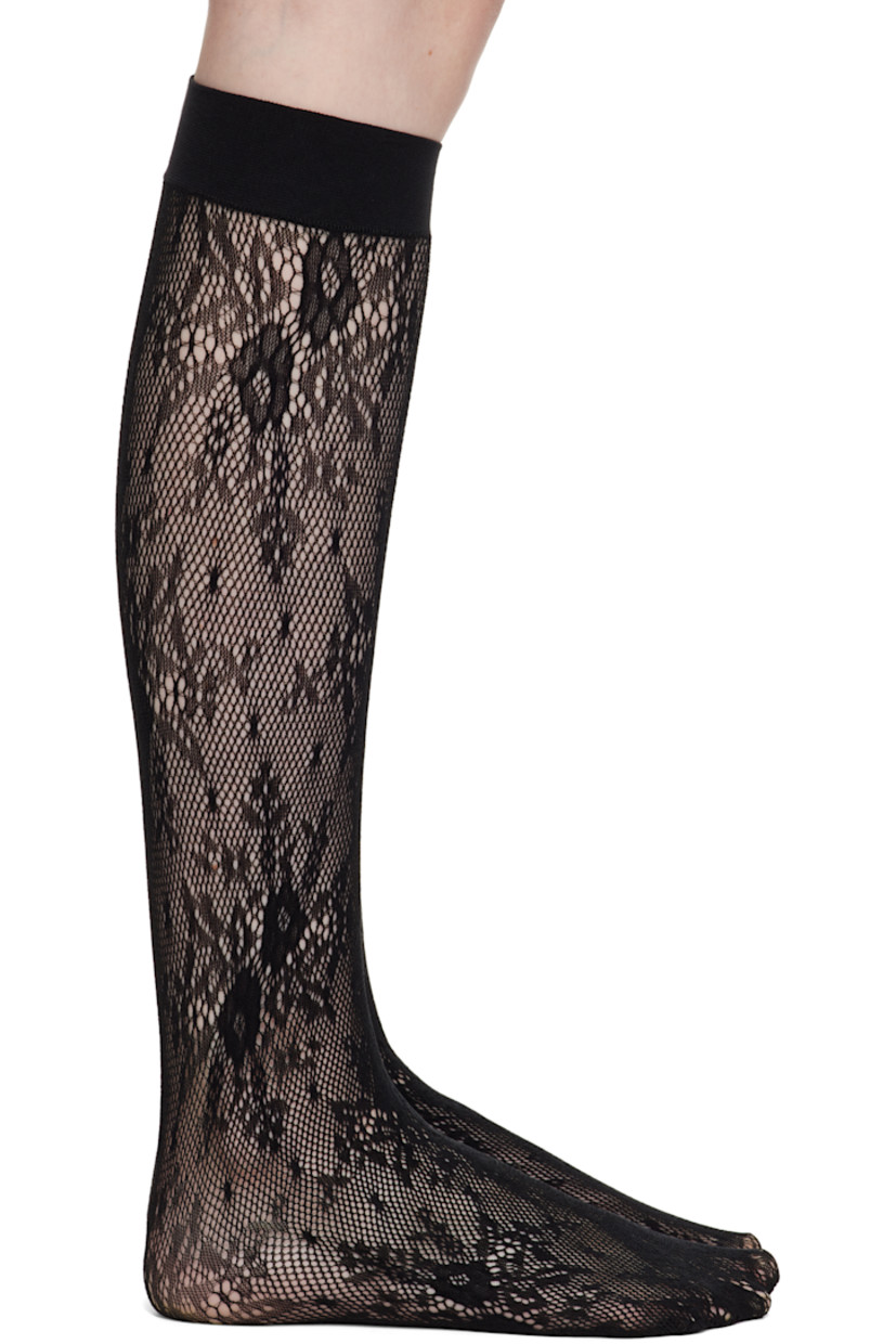 Knee-high stretch ECONYL® recycled nylon lace socks in black.

· Semi-sheer
· Jacquard floral pattern throughout
· Elasticized cuffs

Supplier color: Black
