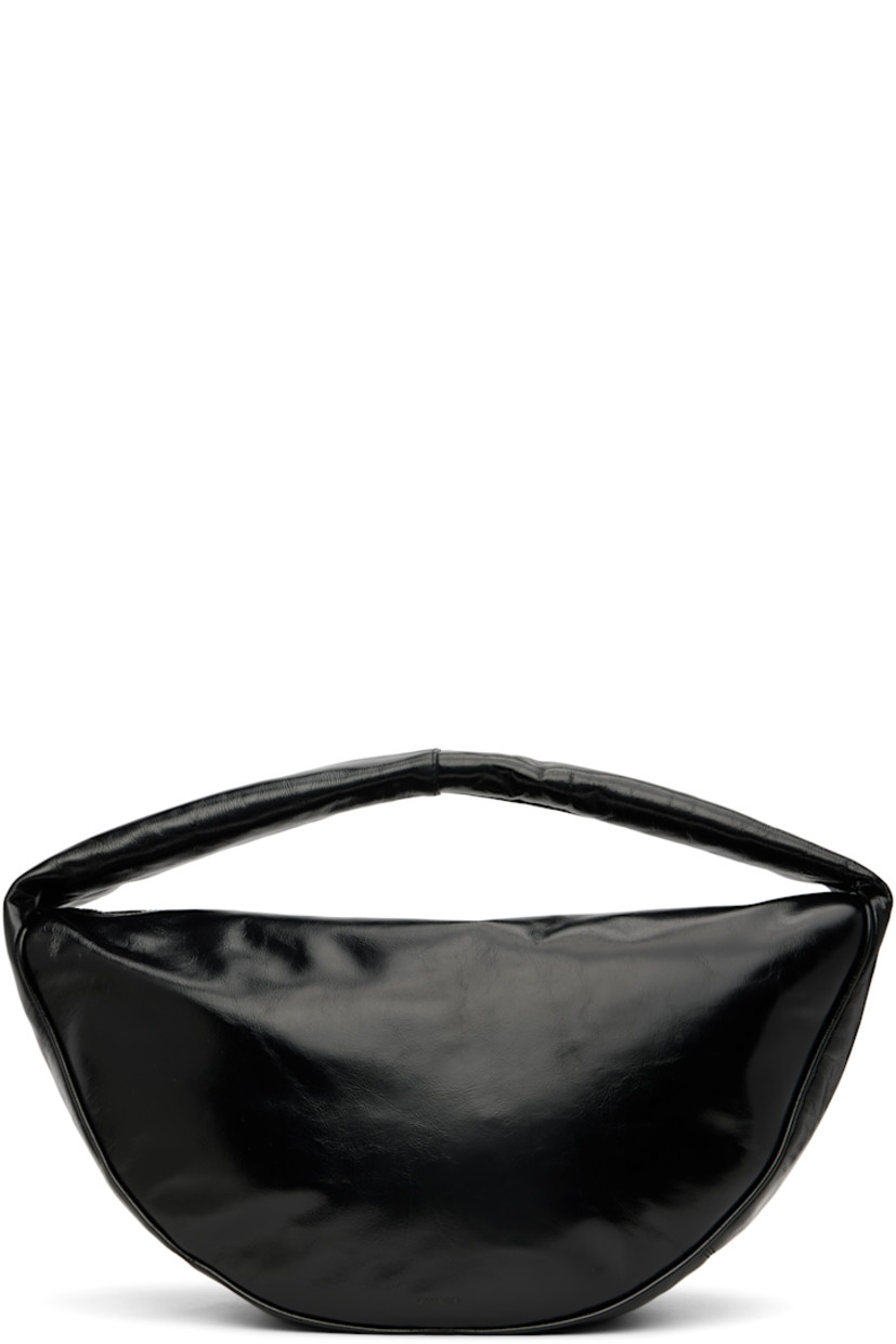 Crinkled lambskin shoulder bag.

· LWG-certified leather
· Fixed shoulder strap
· Logo embossed at face
· Two-way zip closure
· Zip pocket at interior
· Cotton twill lining
· H11" x W16.75" x D7"

Supplier color: Black