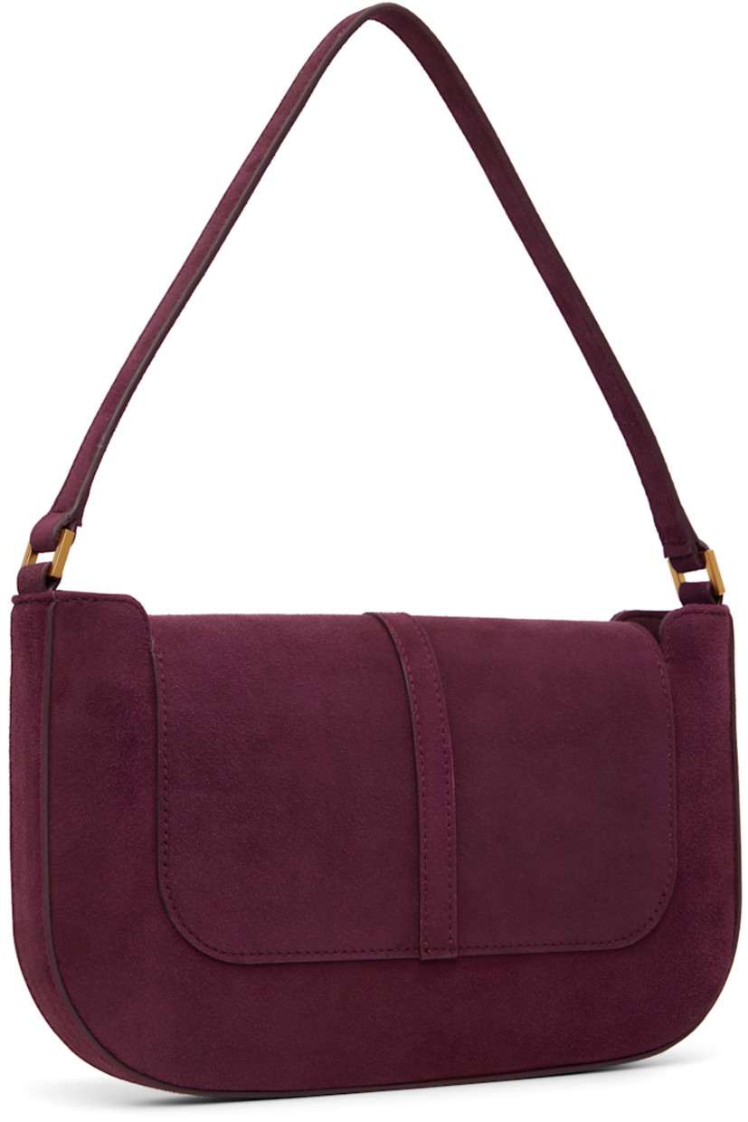 Goatskin suede shoulder bag. 

· Fixed shoulder strap
· Pin-buckle strap at magnetic press-stud flap
· Patch pocket at interior
· Microfiber lining
· Gold-tone hardware
· H6.5" x W11" x D1"

Supplier color: Sour cherry
