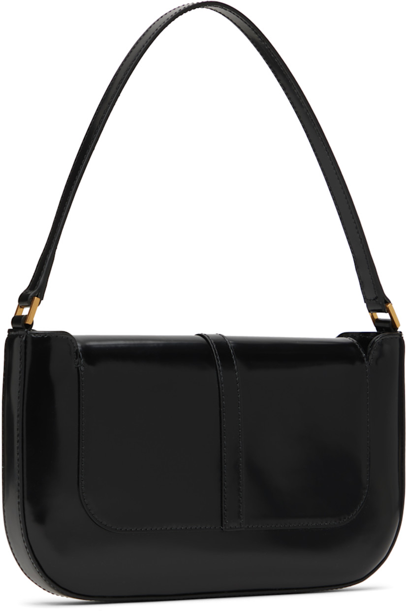 Patent leather shoulder bag.

· LWG-certified leather
· Fixed shoulder strap
· Pin-buckle hardware at magnetic press-stud flap
· Patch pocket at interior
· Cotton twill lining
· H6" x W10.75" x D1"

Supplier color: Black