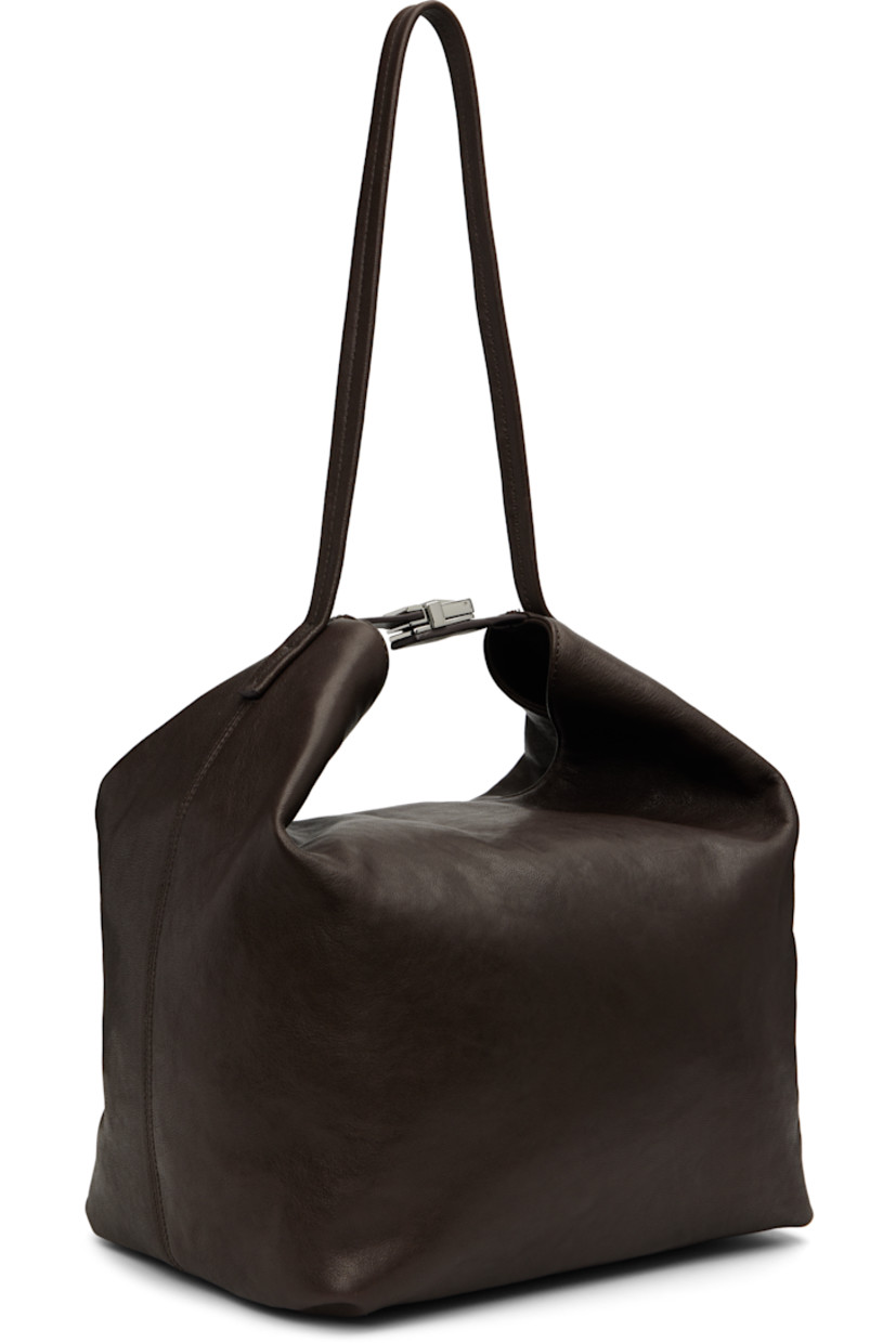 Crinkled lambskin shoulder bag.

· Fixed shoulder strap
· Press-release fastening at top
· Magnetic closure
· Microfiber lining
· Logo-engraved silver-tone hardware
· H12" x W10.5" x D9"

Supplier color: Ristretto