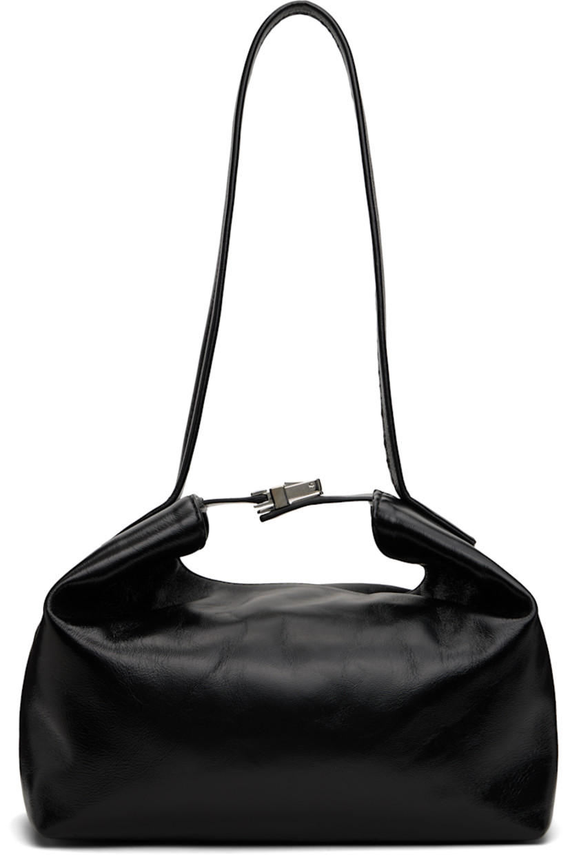 Crinkled lambskin shoulder bag.

· Fixed shoulder strap
· Press-release fastening at top
· Magnetic closure
· Faux-suede lining
· Logo-engraved silver-tone hardware
· H8" x W10" x D5.75"

Supplier color: Black