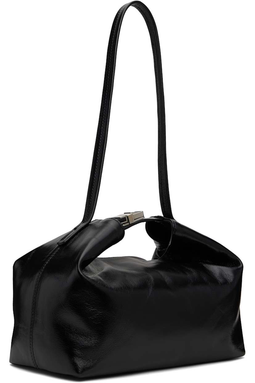 Crinkled lambskin shoulder bag.

· Fixed shoulder strap
· Press-release fastening at top
· Magnetic closure
· Faux-suede lining
· Logo-engraved silver-tone hardware
· H8" x W10" x D5.75"

Supplier color: Black